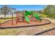 playground with slides and climbing structures at 11630 Woodleaf Dr, Bradenton, FL 34211