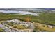 Aerial view showing condo location near water at 120 Tidy Island Blvd # 120, Bradenton, FL 34210