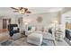 Cozy living room with light-colored sofa and ottoman at 120 Tidy Island Blvd # 120, Bradenton, FL 34210