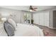 Main bedroom with king-size bed and private access to lanai at 120 Tidy Island Blvd # 120, Bradenton, FL 34210