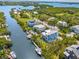 Waterfront home community with lush landscaping at 130 Burns Rd, Terra Ceia, FL 34250