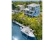 Luxury waterfront home with private dock and boat at 130 Burns Rd, Terra Ceia, FL 34250