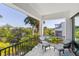 Relaxing balcony with seating, offering tranquil water views at 130 Burns Rd, Terra Ceia, FL 34250