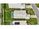 Aerial view of a house with a private pool and well-maintained yard at 1364 Berkshire Ct, Venice, FL 34292