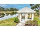 Gazebo with benches overlooking a pond at 1364 Berkshire Ct, Venice, FL 34292