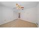 Bedroom featuring neutral carpet, closet and ceiling fan at 1426 Landview Ln, Osprey, FL 34229