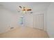 Bedroom featuring neutral carpet, closet and ceiling fan at 1426 Landview Ln, Osprey, FL 34229