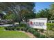 The Southbay Yacht & Racquet Club entrance sign with lush landscaping at 1426 Landview Ln, Osprey, FL 34229