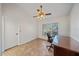 Home office featuring tile floors, neutral walls, and a ceiling fan at 1426 Landview Ln, Osprey, FL 34229