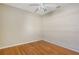 Bedroom with wood floors and a ceiling fan at 146 Willow Bend Way, Osprey, FL 34229