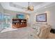 Relaxing living room with recessed lighting, beige sofas and large artwork at 146 Willow Bend Way, Osprey, FL 34229