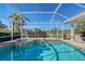 Inviting screened pool with spa and spacious deck at 146 Willow Bend Way, Osprey, FL 34229