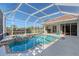 Inviting screened pool with spa and spacious deck at 146 Willow Bend Way, Osprey, FL 34229