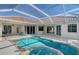 Inviting screened pool with spa and spacious deck at 146 Willow Bend Way, Osprey, FL 34229