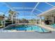 Inviting screened pool with spa and spacious deck at 146 Willow Bend Way, Osprey, FL 34229