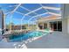 Inviting screened pool with spa and spacious deck at 146 Willow Bend Way, Osprey, FL 34229