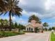 Inviting community guard house with stone accents, tropical landscaping, and a secure gated entrance at 15326 Castle Park Ter, Lakewood Ranch, FL 34202