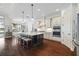 Spacious kitchen with an oversized island, pendant lighting, and modern appliances at 15326 Castle Park Ter, Lakewood Ranch, FL 34202