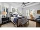 Tranquil main bedroom retreat with tray ceilings, plantation shutters, and stylish decor at 15326 Castle Park Ter, Lakewood Ranch, FL 34202