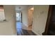 Bright entryway with tile flooring and access to other rooms at 1535 Nursery Rd # 107, Clearwater, FL 33756