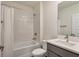 Clean bathroom with tub, shower, and modern vanity at 17209 Barnwood Pl, Bradenton, FL 34211