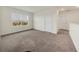 Spacious bedroom with neutral carpeting and a large window offering natural light at 17209 Barnwood Pl, Bradenton, FL 34211