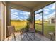 Relaxing screened porch overlooking backyard at 17209 Barnwood Pl, Bradenton, FL 34211