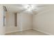 Neutral bedroom featuring tile flooring, a modern ceiling fan and window with blinds at 17278 Acapulco Rd # 312, Punta Gorda, FL 33955