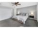 Spacious bedroom with a ceiling fan and neutral tones at 17395 Palmetto Pass Ln, Punta Gorda, FL 33982