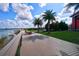 Scenic boardwalk with bench and water view in a beautiful community setting at 17395 Palmetto Pass Ln, Punta Gorda, FL 33982