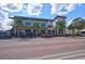 Commercial building in town center with palm trees and ample parking at 17395 Palmetto Pass Ln, Punta Gorda, FL 33982