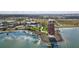 Aerial view of the observation tower surrounded by water and lush landscape at 17395 Palmetto Pass Ln, Punta Gorda, FL 33982