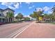 Charming town center street with brick pavement and pedestrian crossing at 17395 Palmetto Pass Ln, Punta Gorda, FL 33982