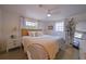 Main bedroom with king-size bed and light decor at 1752 Banyan Dr, Venice, FL 34293