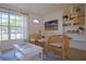 Living room with white coffee table and two chairs at 1752 Banyan Dr, Venice, FL 34293