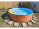 Small round pool with a yellow inflatable duck at 1752 Banyan Dr, Venice, FL 34293