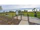 Fenced-in dog park with benches and waste disposal at 17723 Gulf Ranch Pl, Lakewood Ranch, FL 34211