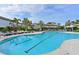 Resort-style pool with lounge chairs and cabanas at 17723 Gulf Ranch Pl, Lakewood Ranch, FL 34211