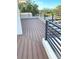 Spacious balcony with composite decking and metal railings at 2110 Michele Dr, Sarasota, FL 34231