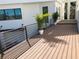 Modern deck with planters and a view of the home at 2110 Michele Dr, Sarasota, FL 34231