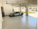 Finished garage with epoxy flooring and ample space at 2110 Michele Dr, Sarasota, FL 34231