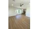 Spacious living room with wood floors and an open floor plan at 2110 Michele Dr, Sarasota, FL 34231