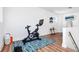 Home gym with stationary bike and yoga mat at 2254 Hawthorne St, Sarasota, FL 34239