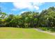 Paved path winds through lush park landscape at 2254 Hawthorne St, Sarasota, FL 34239