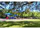 Playground with shaded play structures at 2254 Hawthorne St, Sarasota, FL 34239