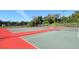 Three lighted tennis courts at 2254 Hawthorne St, Sarasota, FL 34239