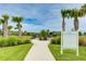 Well-maintained dog park for residents, featuring rules and hours at 2582 Wild Cherry Path, Sarasota, FL 34240