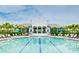 Large resort-style pool with plenty of lounge chairs at 2582 Wild Cherry Path, Sarasota, FL 34240