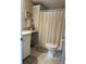 Clean bathroom with a toilet, shower, and vanity at 2601 Gulf N Dr # 427, Bradenton Beach, FL 34217