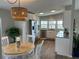 Modern kitchen with stainless steel appliances and light cabinets at 2601 Gulf N Dr # 427, Bradenton Beach, FL 34217